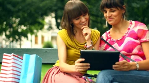 Two happy women with tablet computer, steadycam shot Stock Footage 8678776