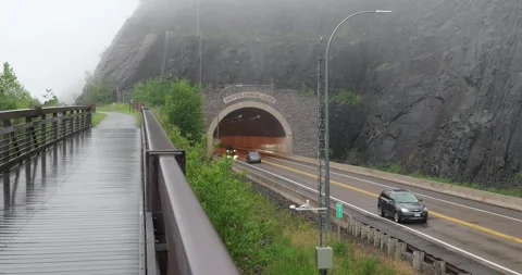 TWO HARBORS, MN - 18 JUN 2024: Vehicles at a Minnesota tunnel Video stock 288164333