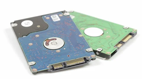 Two hard drive rotating on white background Video stock 40592210