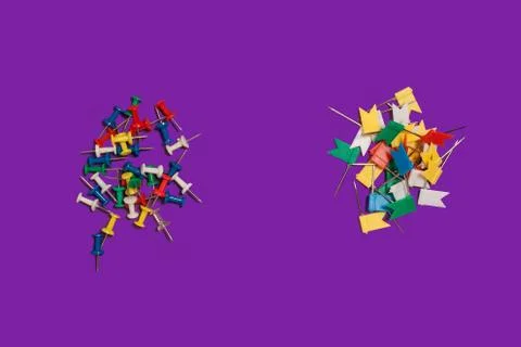 Two heaps of pushpins and pin flags Stock Photos