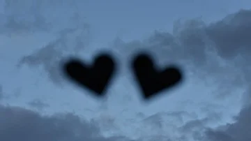 Two heart on cloudy sky, Love and Valentine's Day Concept Stock Footage 85673545