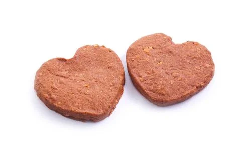 Two heart pattern chocolate cookies Two heart pattern chocolate cookies is... Stock Photos