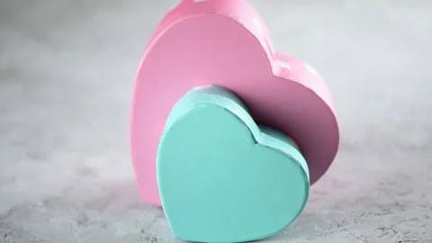 Two heart shape box on a grey background. Gift for Valentines Day Stock Footage 146484367
