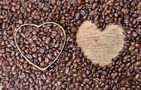 Two heart-shaped in coffee beans Stock Photos