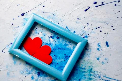 Two hearts in the blue frame,spray paint the background Stockfoto's