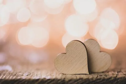 Two hearts on bokeh background Stock Photos