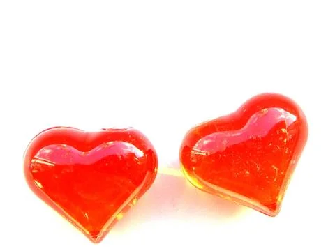 Two hearts close up on a white background Stock Photos