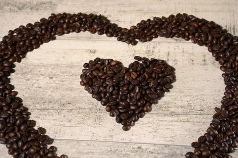 Two hearts  from coffee beans Stock Photos