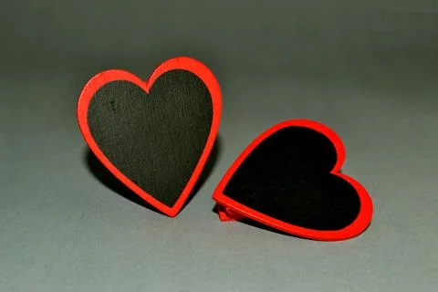 Two hearts on a gray background. Space for text Foto stock