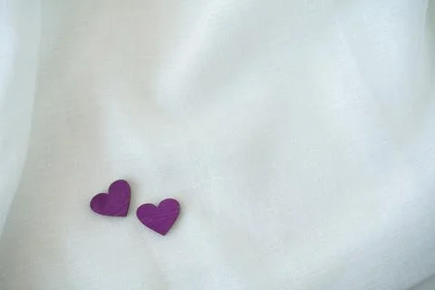 Two hearts on a white background Stock Photos