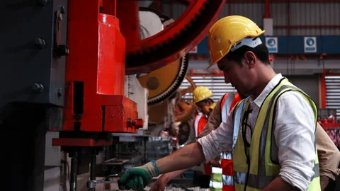 Two heavy industrial engineers check together in a steel factory. Stock Footage 173370836