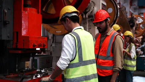 Two heavy industrial engineers check together in a steel factory. Video stock 173384123