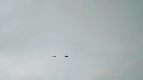 Two Helicopters In Blue Sky. Stock Footage 107721980