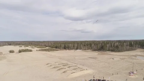 	Two helicopters fly over the training field Stock Footage 76838371