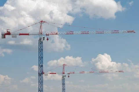 Two high cranes Stock Photos