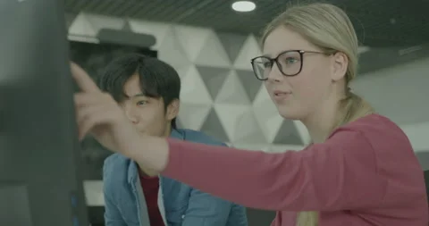 Two High School Education Students in Classroom Learning Computer Technology Stock Footage 202150847