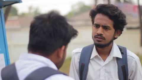 Two High School Students Are Discussing, Close-UP OTS Shot Stock Footage 291304488