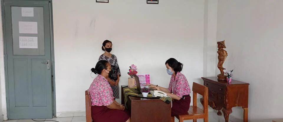 Two high school students practicing speaking English in a classroom in Indonesia Stock Photos