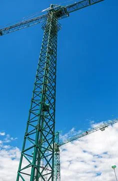 Two high tower cranes Stock Photos