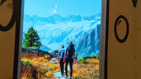 Two Hikers Exploring Alpine Glacier Landscape, Switzerland 4K Stock Footage 340900017