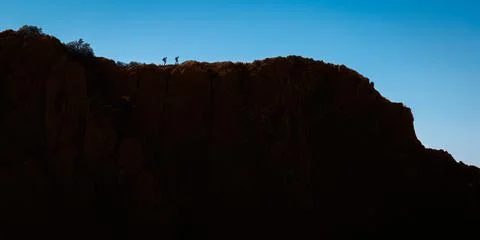 Two hikers on a mountain ridge Stock Photos