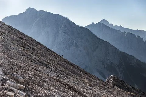 Two hikers on mountains Stock Photos