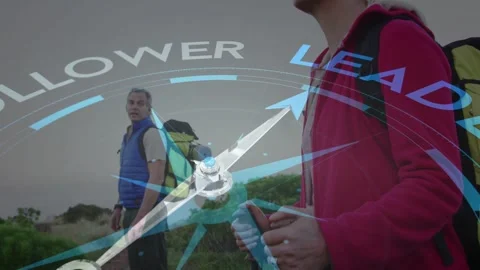 Two hikers reacting to compass overlay appearing on trail, woman stepping Stock Footage 334351761
