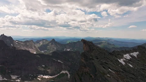 Two hikers at the top of the mountain Stock Footage 278321540