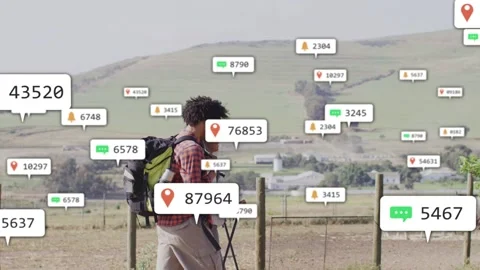 Two hikers walking path, creating AR pins and chat bubbles, labels densifying Stock Footage 333463485