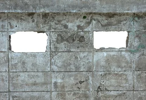 Two holes on the old cement wall Stock-Fotos