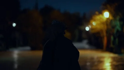 Two hooded men doing transaction at night,suspicious activity Stock-Footage 73891948