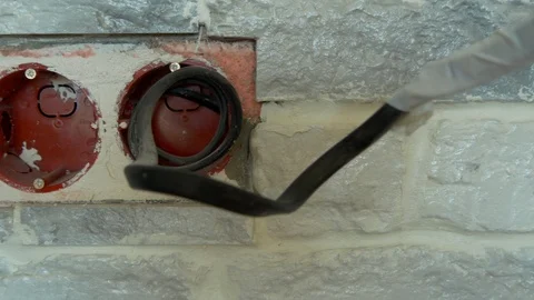 Two Horizontal Openings With Wires And Two Closed In The Wall For Sockets. Stock Footage 90065689