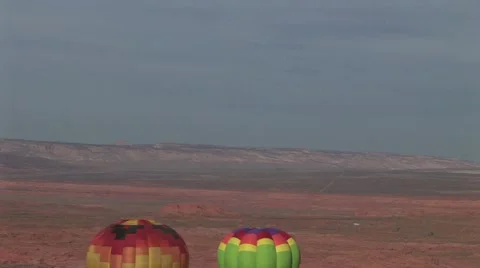 Two Hot Air Balloons Taking Off in the Desert of New Mexico Stock-Footage 19144763