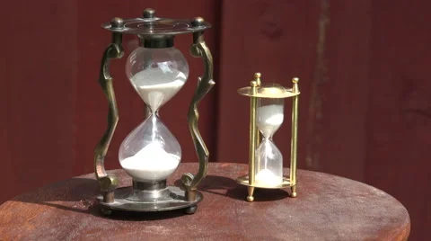 Two hourglasses with sand, 4K Stock Footage 65453581