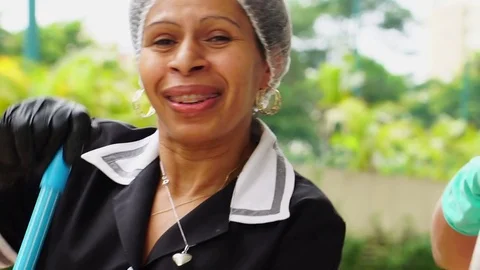 Two Housekeeper Friends Dancing and Having Fun Stock Footage 83455504