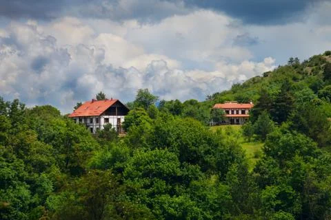Two houses in the forest Stock Photos