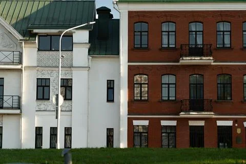 Two houses standing side by side in different styles of construction Stock Photos