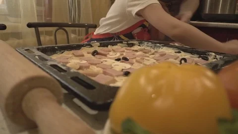 Two Housewives Throw on Raw Pizza Olives Stock Footage 74154769