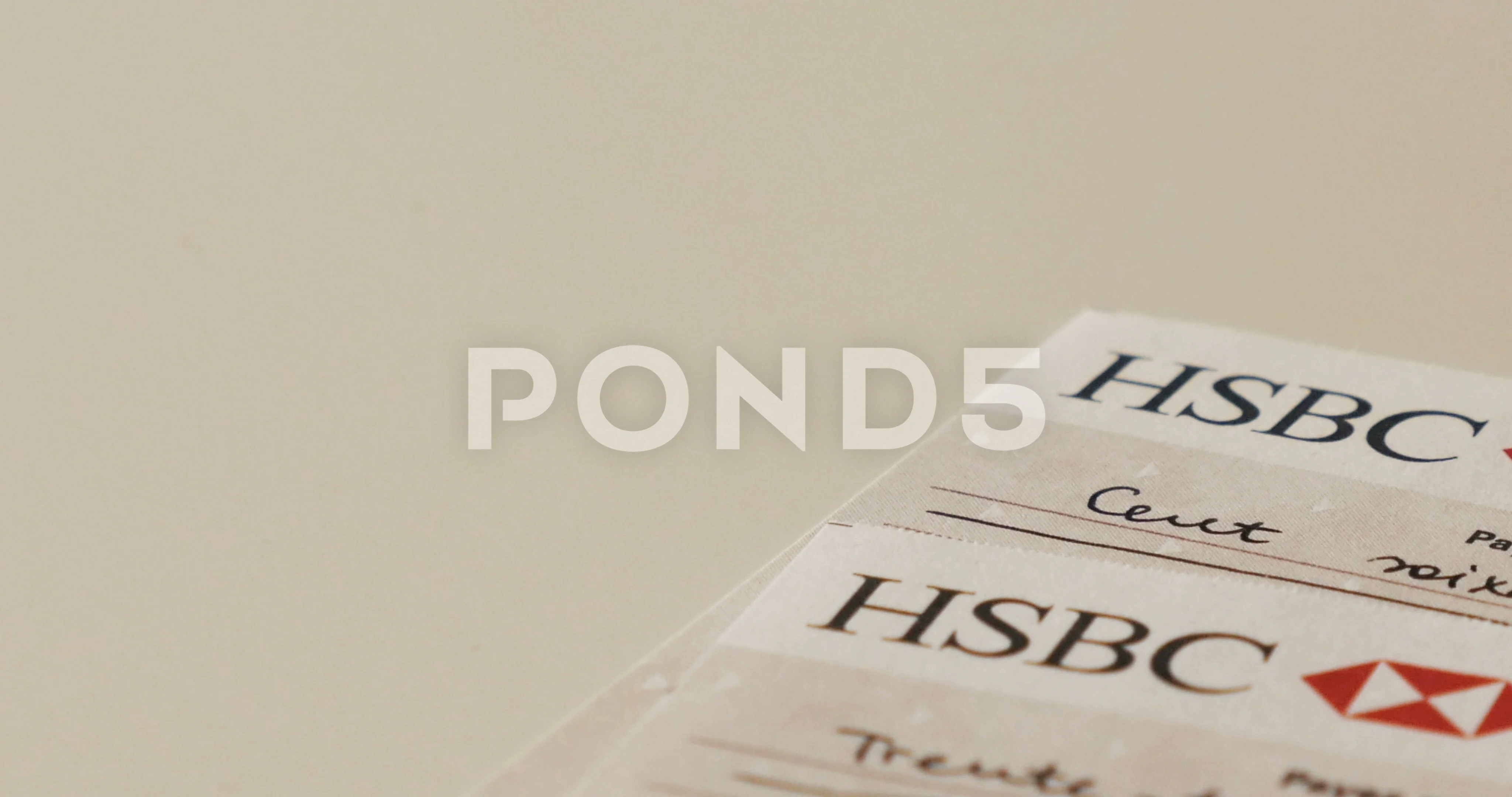 Two Hsbc Bank Checks On Table Hi Res Video 72009511