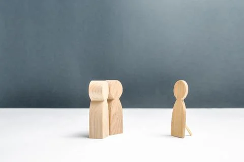 Two human figures look at a false human figure. The concept of deception an.. Stock Photos