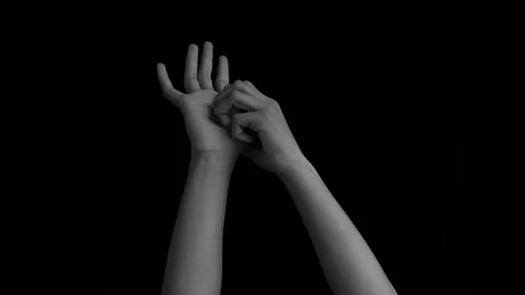 TWO HUMAN HANDS COMING UP AND ITCHING ON... | Stock Video | Pond5
