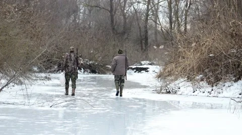 Two hunters go on the ice Video stock 47027586
