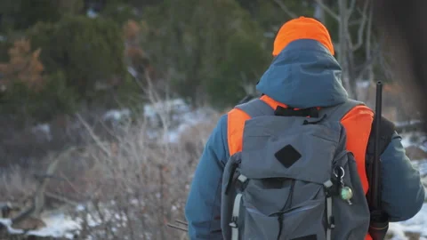 two hunters with rifles walking while ob... | Stock Video | Pond5
