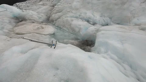 Two ice-axes stuck in a glacier ice, Skaftafell, Iceland Stock Footage 219600289