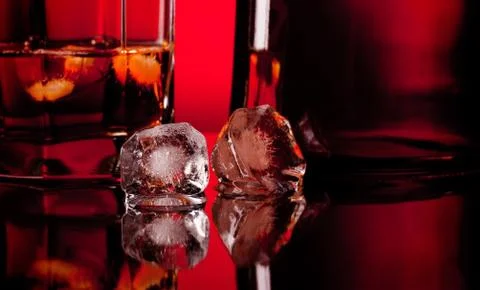 Two ice cube and whiskey Stock Photos