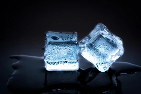 Two ice cubes Stock Photos