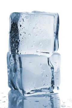 Two ice cubes with water drops Stock Photos