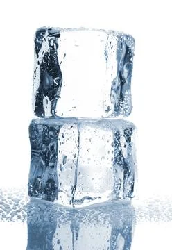 Two ice cubes with water drops Stock Photos