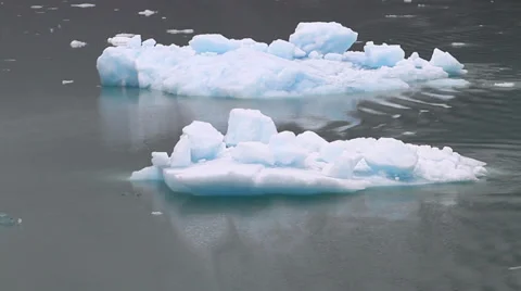 Two Icebergs floating past close-up Video stock 32242076
