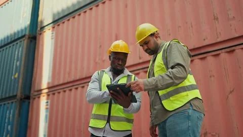 Two industrial engineer control container box from factory to cargo freight ship 스톡 동영상 261697039